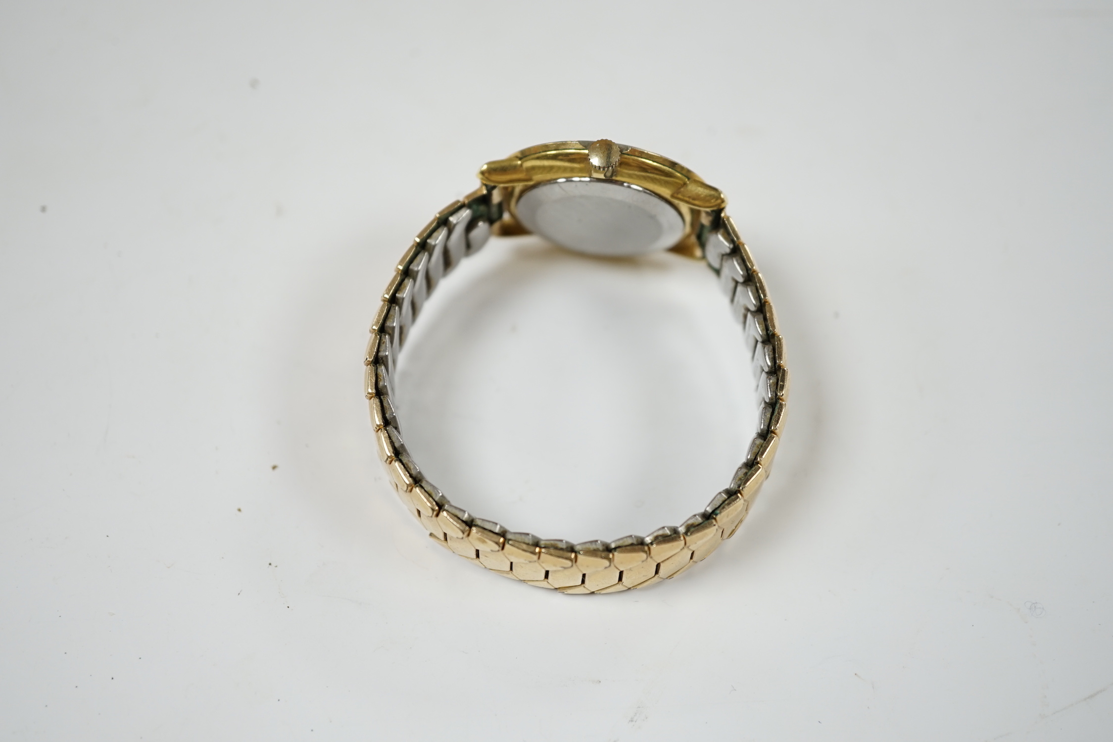 A gentleman's steel and gold plated Omega De Ville manual wind wrist watch, on associated flexible strap, case diameter 33mm, no box or papers.